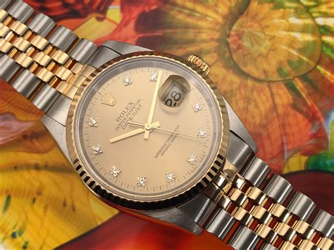 rolex oyster perpetual datejust gold watch