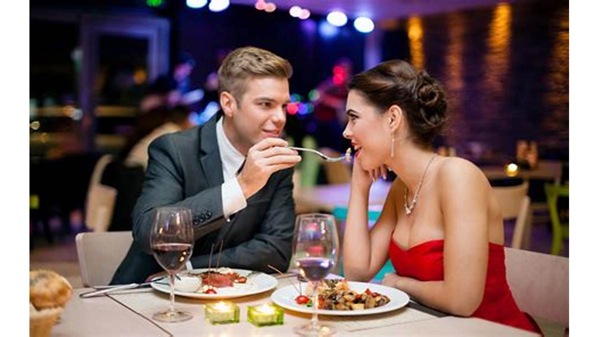 romantic restaurant kiss