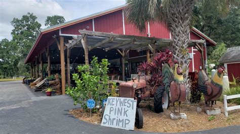 roosters produce on palm beach blvd