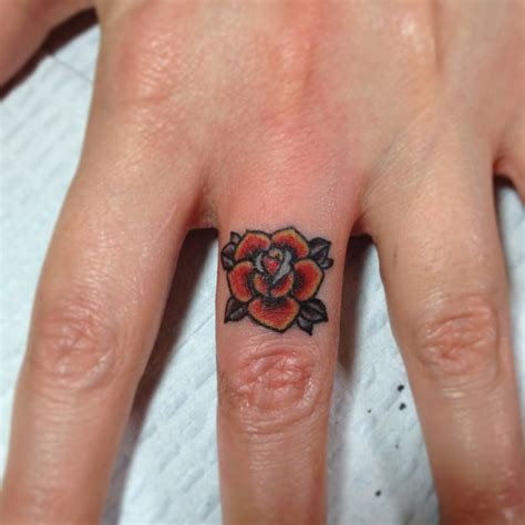 Informative Rose Finger Tattoo Designs Ideas
