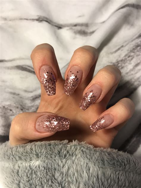 French gel extensions with rose gold glitter ombré & rose gold studs so