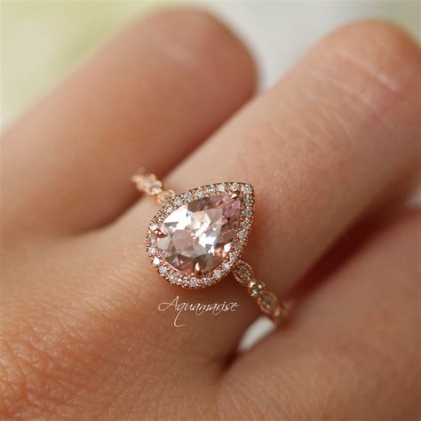 rose gold tear drop engagement rings