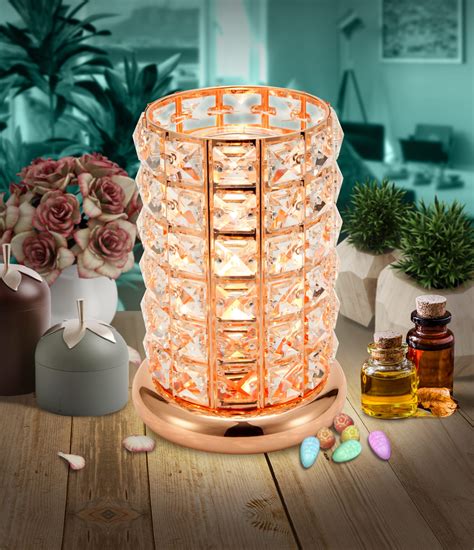 A close-up of the lamp's rose gold finish, highlighting its intricate details.