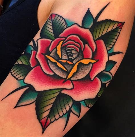 Traditional rose tattoo Traditional rose tattoos, Tattoos, Tattoo designs