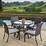 Claire Wicker 5 Piece Round Patio Dining Set with Cushion