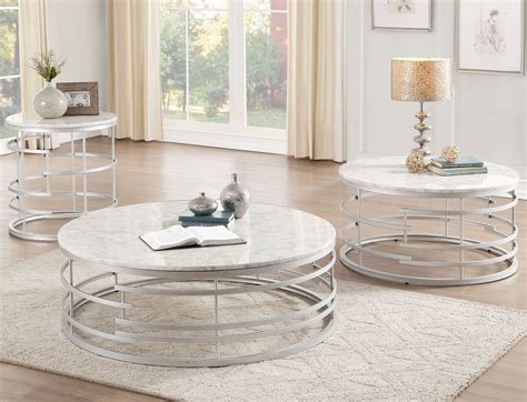 SEI Furniture Jaymes Round Glass Top Coffee Table in Silver