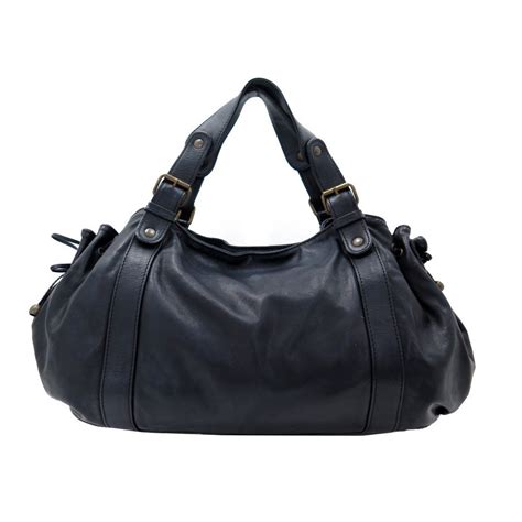 Gerard Darel Maroquinerie les articles de la marque Maroquinerie