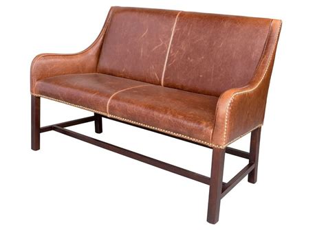 Experience Style and Comfort with a Saddle Leather Bench: Perfect Addition to Any Space