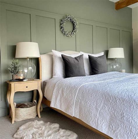 Comfortable Green Master Bedroom With Wood Furnishings