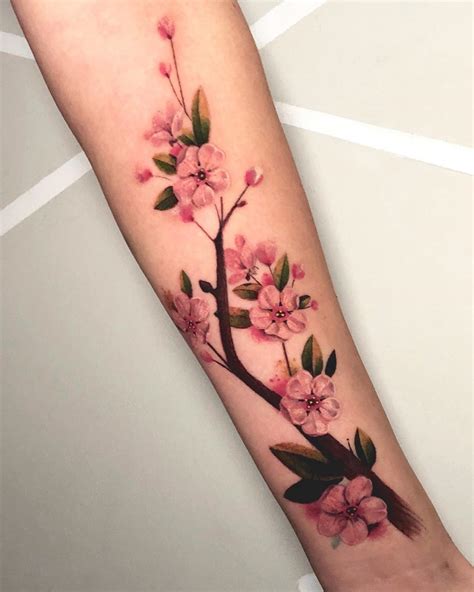 +21 Sakura Flower Tattoo Designs References