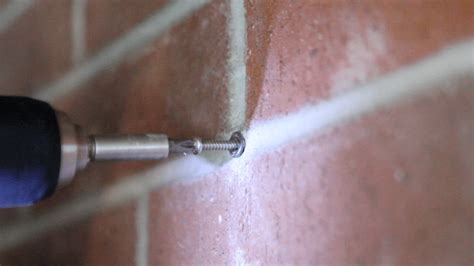 Screw In Brick Wall