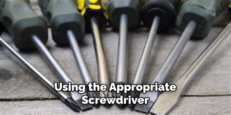 Screwdriver removing drain cover