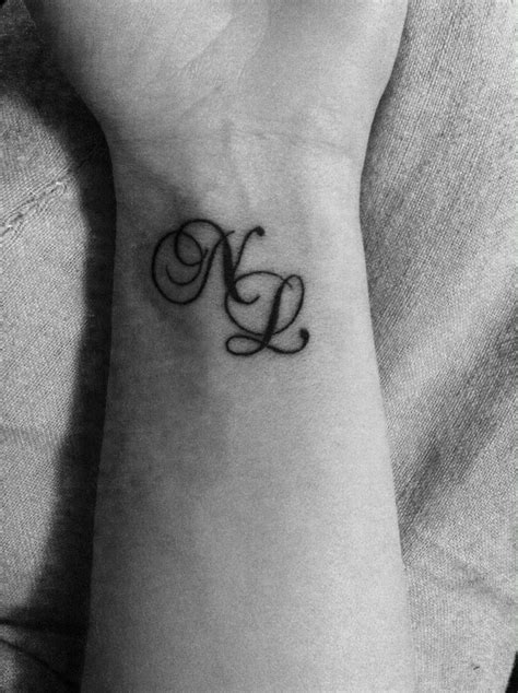 Scripted Initials tattoo ideas with initials