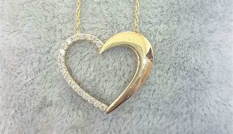 Diamond heart pendant 18ct white gold sculptural heart pendant
