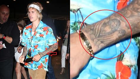 Selena Gets A Tattoo Of Justin Bieber's Face On Her Arm