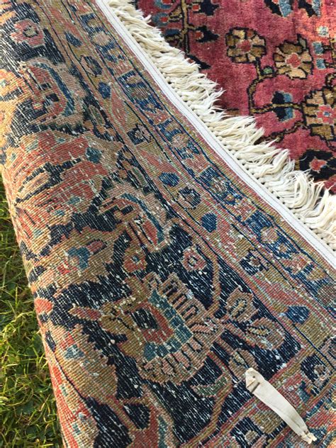 sell antique persian rug