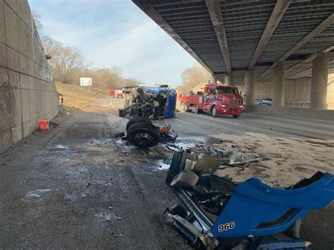 semi truck hits overpass