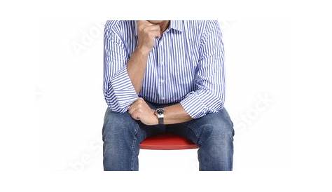 Premium Photo | Handsome man sitting on a chair and showing ok sign