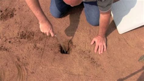 Setting Baseball Base Pegs