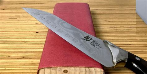 Sharpening Knife On Sandpaper