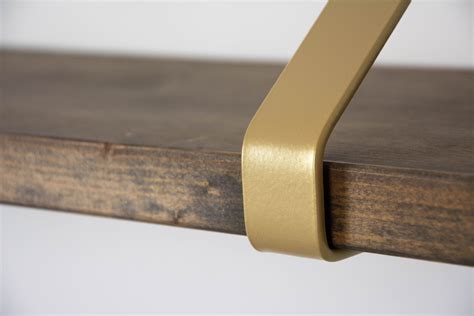 Shelf With Gold Brackets