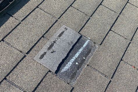 shingles damaged by wind