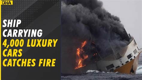 ship catches fire with cars