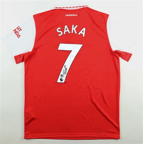 signed saka arsenal shirt