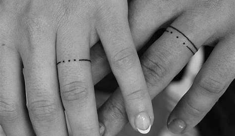 simple line circle/ring tattoos around the fingers