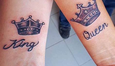 A stylized pair of king and queen crowns tattoos on hand