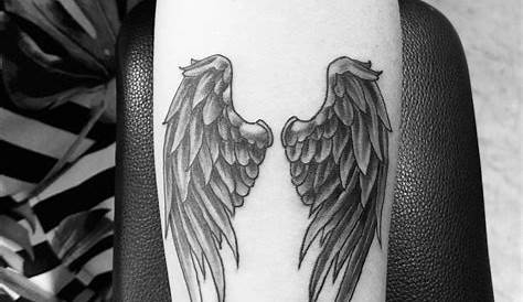 Simple Small Angel Wings Tattoo angelwingstattooonthecollarboneblackshirt