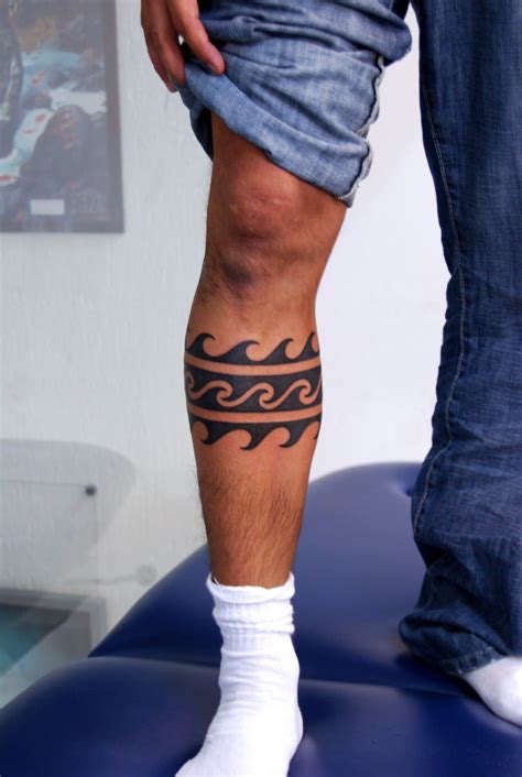 Simple Tribal Leg Tattoos For Guys
