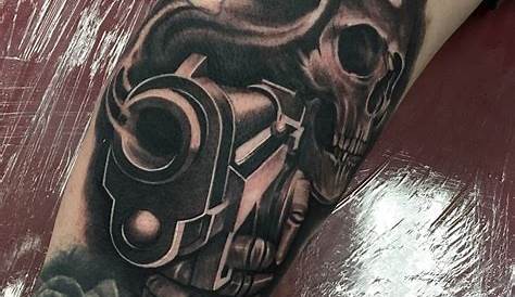 Two Guns and Skull Tattoo - Tattoos Life Style