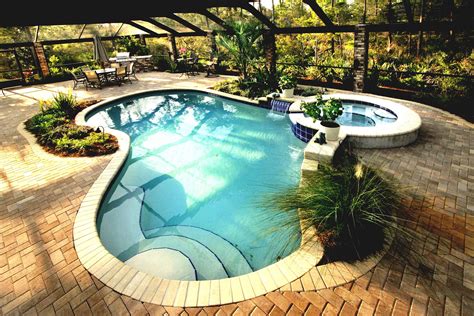 Wilbar optimum semi inground pool with raised patio in 2020 Backyard