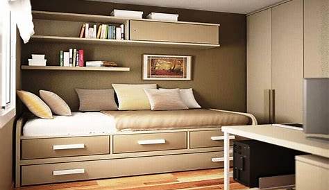 an aerial view of a bedroom with a bed, nightstands and other items on