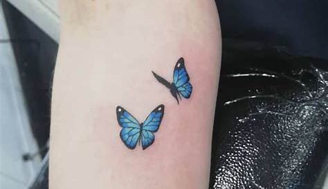 Small Blue Butterfly Tattoo On Hip