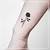 small dark rose tattoo