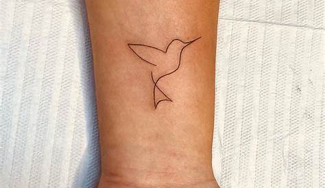 Fine line daisy tattoo on the forearm. Daisy tattoo