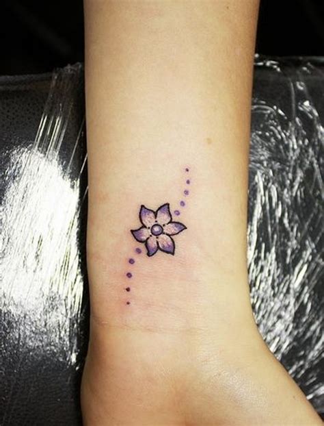 Informative Small Flower Tattoo Designs For Wrist References