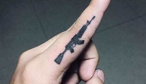 Small Gun Tattoo On Hand » Tattoo Ideas
