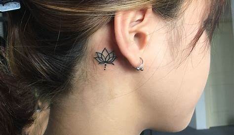 Beautiful elegant small blackink lotus flower tattoo