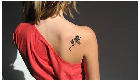 Orchids tattoo on the right shoulder blade Shoulder
