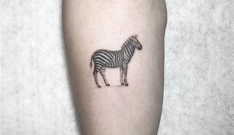 Black ink small zebra tattoos on back shoulder Zebra