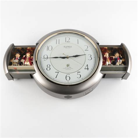 Small World Rhythm Clock Flashing Red Light