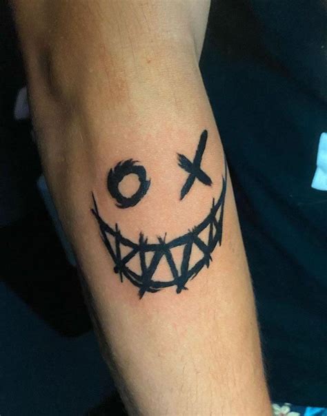 Smiling Face Tattoo
