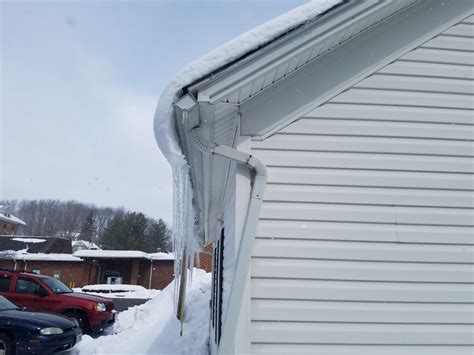 snow stoppers for shingle roof