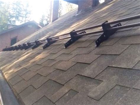 snow stoppers for shingle roof