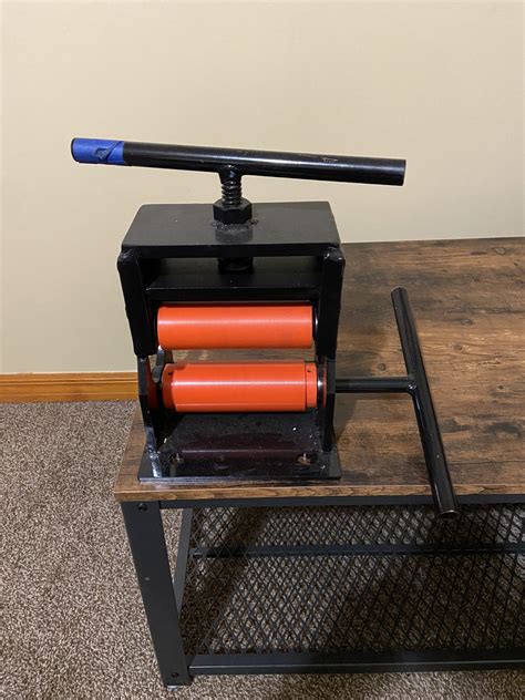 Softball Bat Rolling Machine