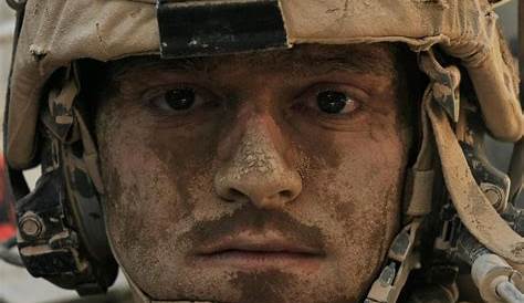 Close Up Soldier Keeping Modern Gun While Wearing Bulletproof Vest