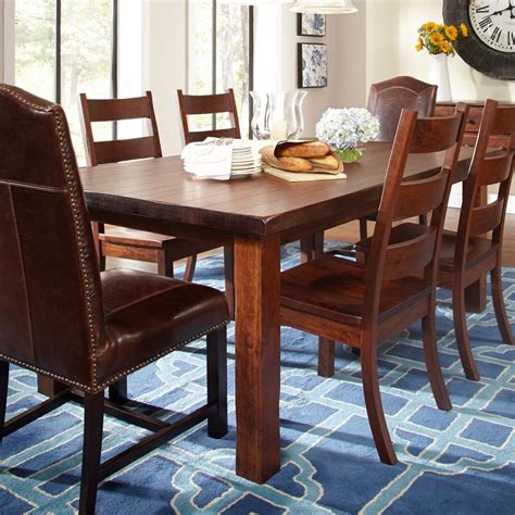 Very nice solid wood dining set cherry finish table and 8 chairs News